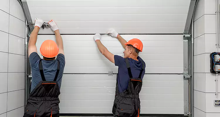 Garage Door Bottom Panel Repair in Belle Glade, FL